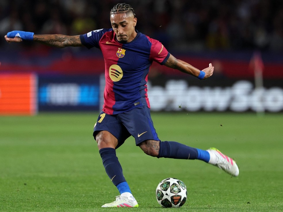 Raphinha soma 20 participações diretas em gols na Champions League 2024/25 — Foto: AFP