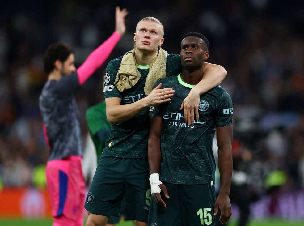 Haaland e Guéhi lamentam derrota do Manchester City para o Real Madrid no Bernabéu — Foto: Reuters