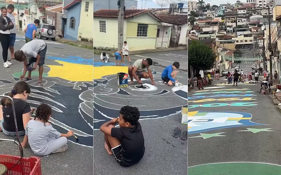 Moradores participam de mutirão e pintam rua para a Copa do Mundo em Pouso Alegre