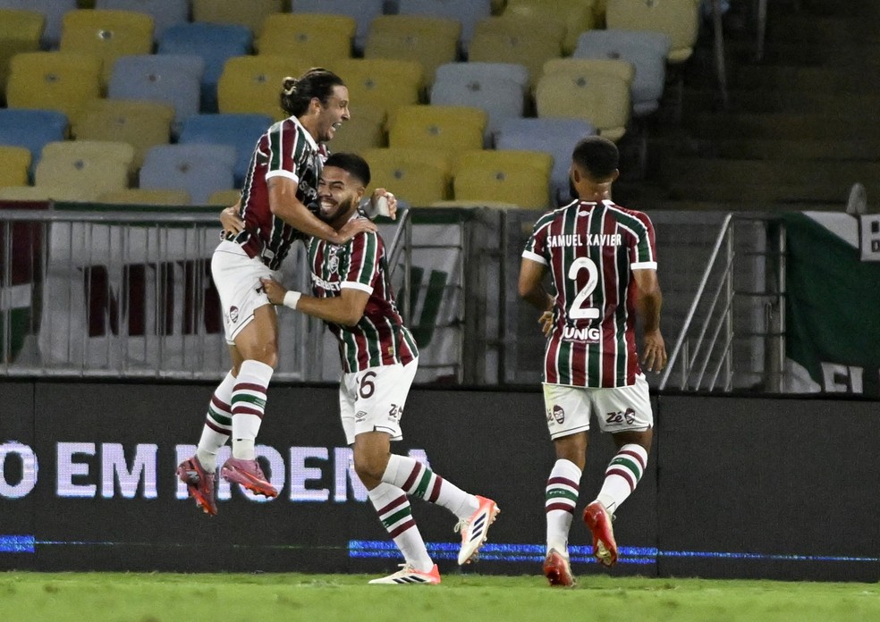 Canobbio, Hrcules e Samuel Xavier comemoram o terceiro do Fluminense sobre o So Paulo  Foto: Andr Duro
