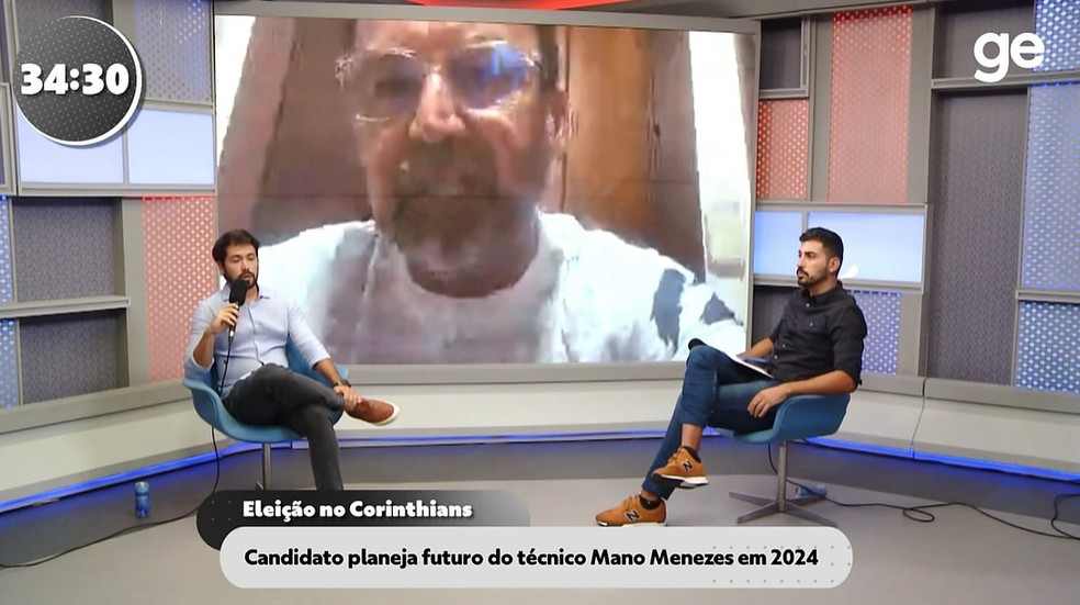Bruno Cassucci e Marcelo Braga entrevistam o candidato Augusto Melo — Foto: Reprodução