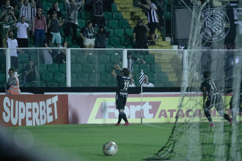 Guilherme Pato of Internacional celebrates a scored goal during a