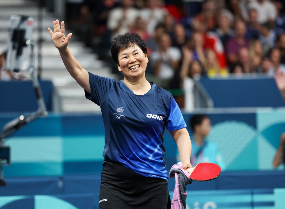 Ni Xia Lian, tenista de 61 anos, de Luxemburgo — Foto: REUTERS